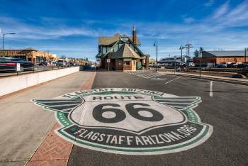flagstaff visitor center parking lot with route 66 mural