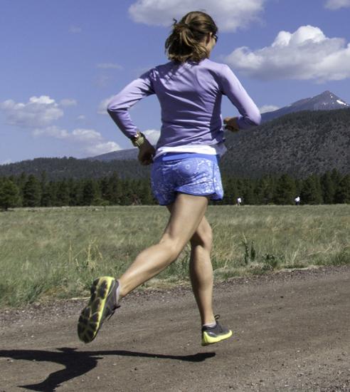 woman running at buffalo park