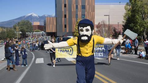 Louie walking in the homecoming parade
