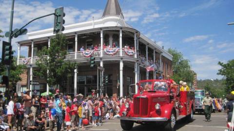 fire truck driving past the Weatherford for the 4th of July parade