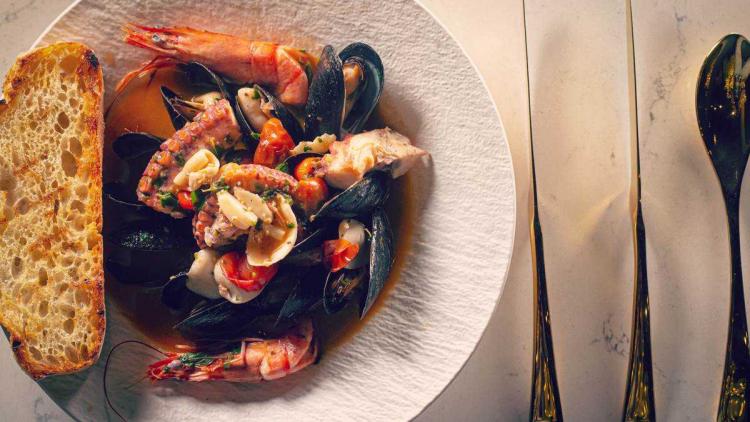 Oysters and crab from Teatro Italian Food & Wine in a white plate
