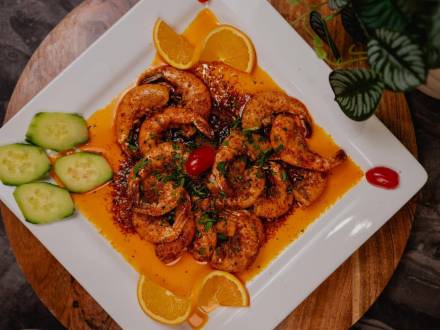 Shrimp on a white plate with Mexican seasonings from Mi Tesoro Modern Mexican