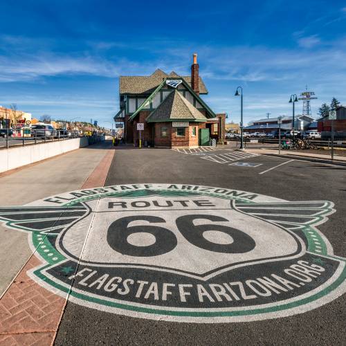 flagstaff visitor center parking lot with route 66 mural