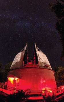 telescope looking up at night sky