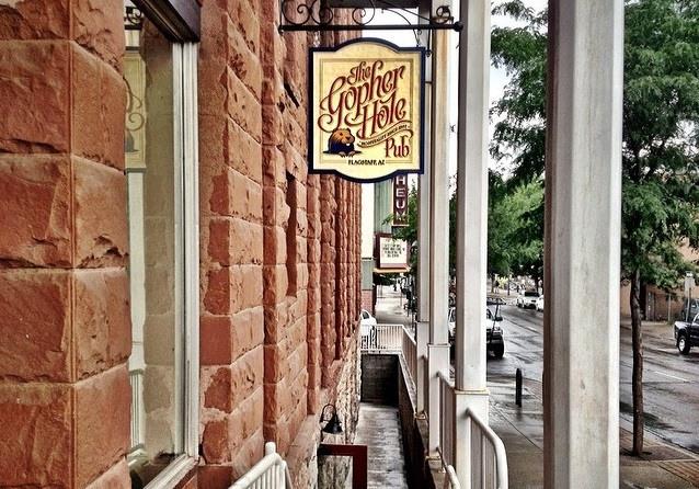 street sign for gopher hole pub