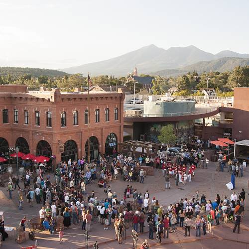 aerial view of people gathering for the Downtown Flagstaff First Friday Art Walk