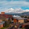 Aerial shot of NAU campus and snowy San Fransisco Peaks.