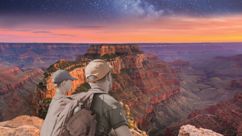 A father and son look out at the Grand Canyon, near Flagstaff, AZ.