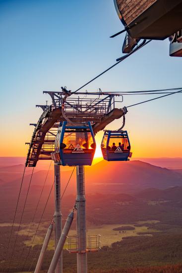 Snowbowl Gondola rides at sunset.